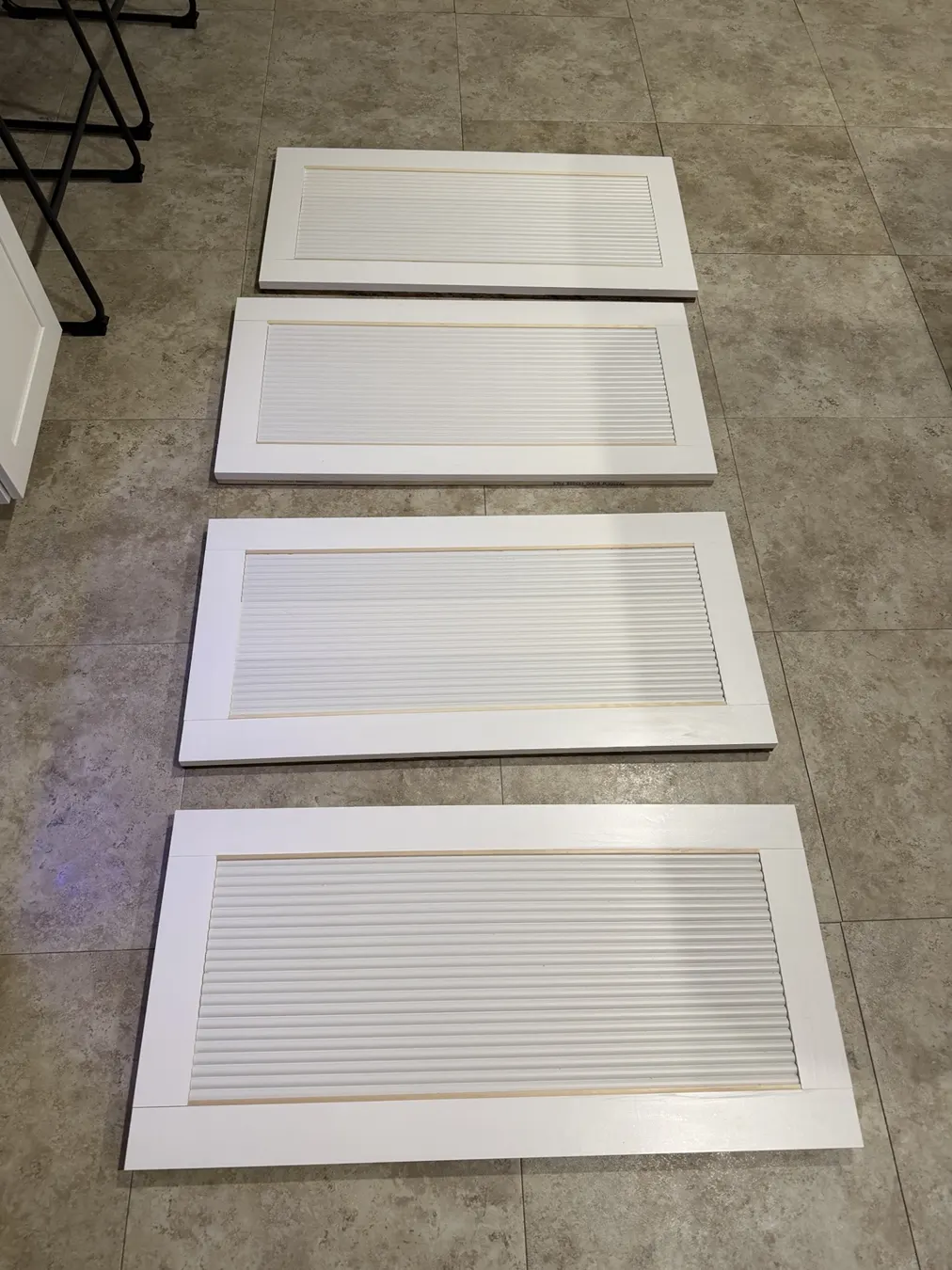 Four doors assembled, sanded, and glued