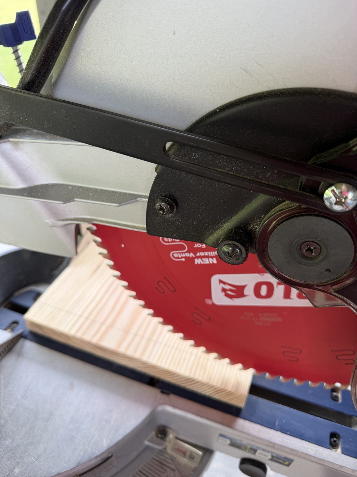 Cutting pine boards to length with a saw