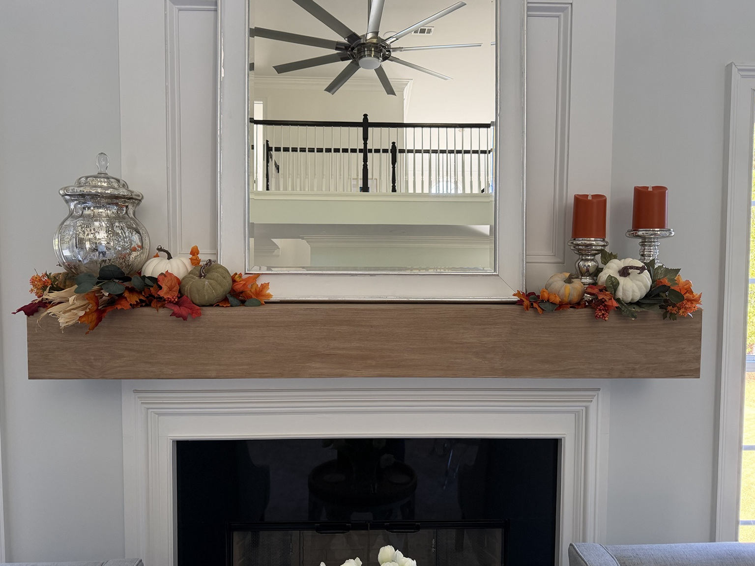 Installed pine mantel after staining and decorating