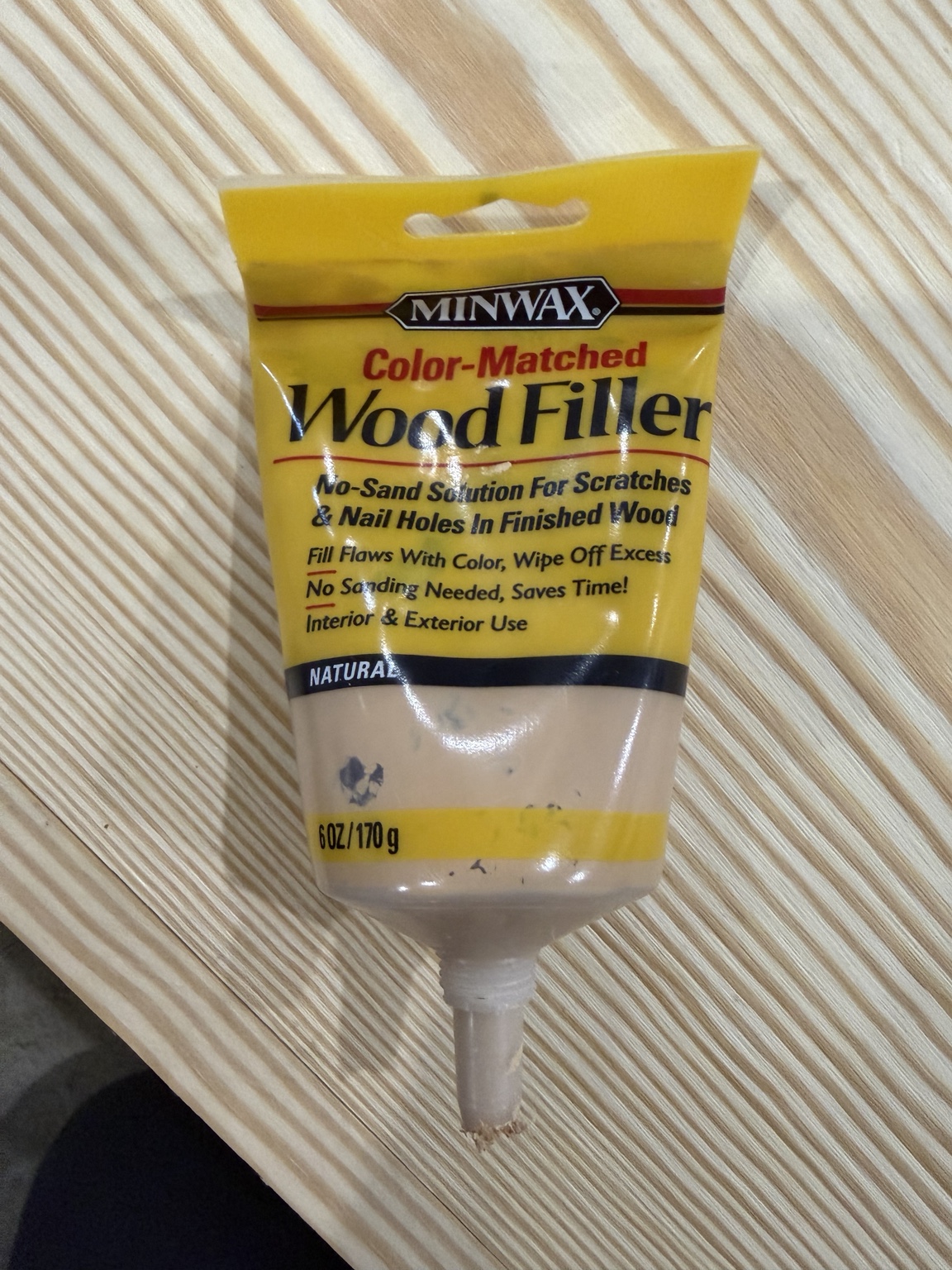 Tube of stainable wood filler used in the mantel build