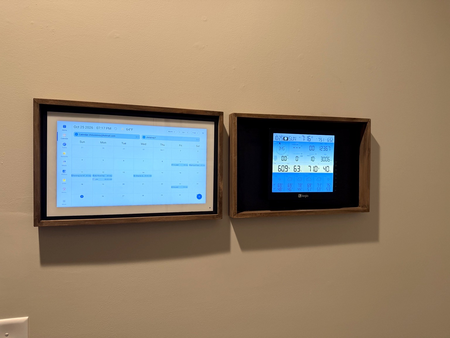 Actual finished DIY wood frames surrounding the calendar and weather station