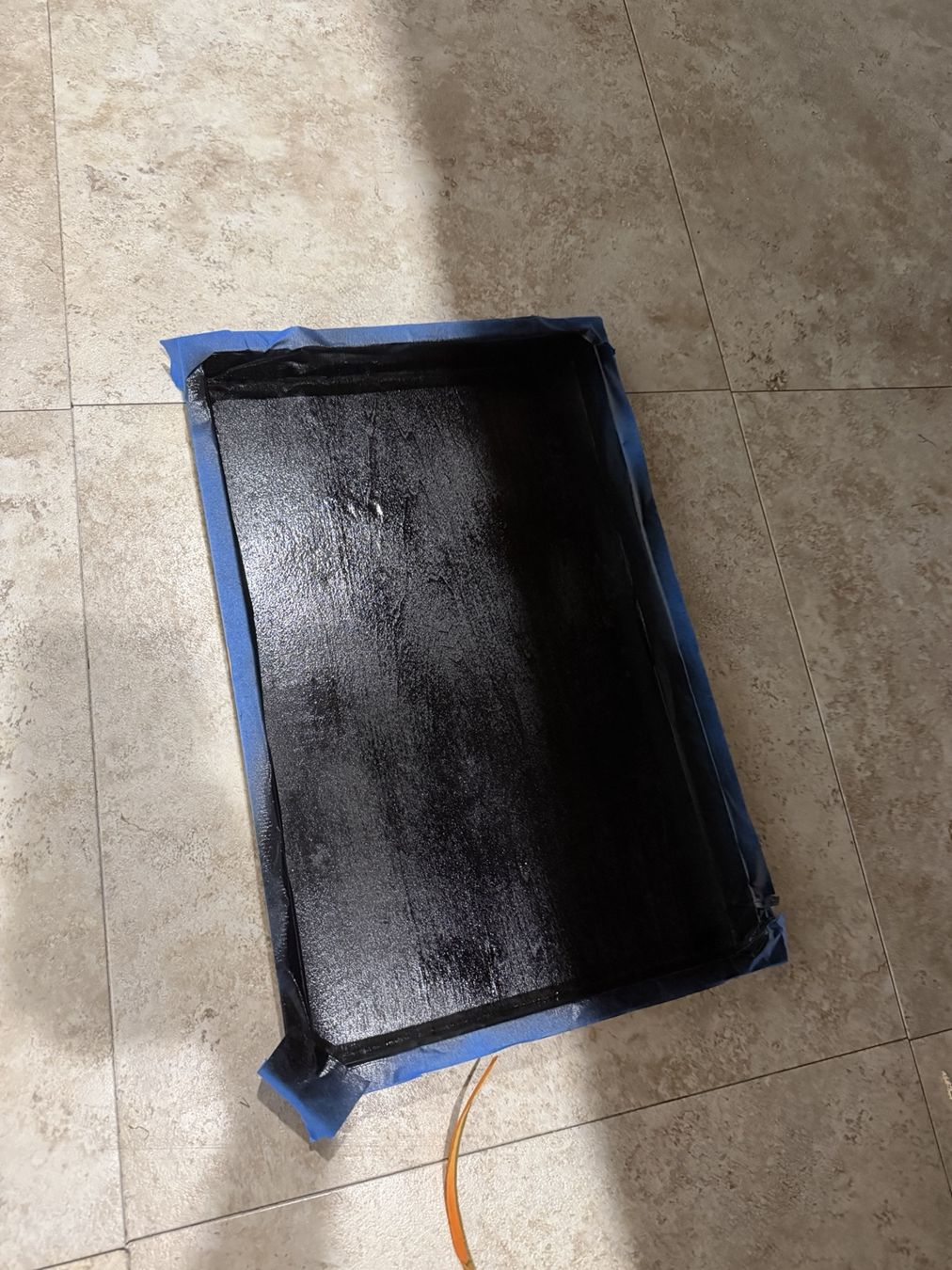 The black-painted center, before staining the exposed wood.
