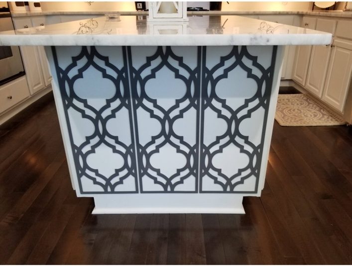 Before: the original island featured bold gray decorative filigree.