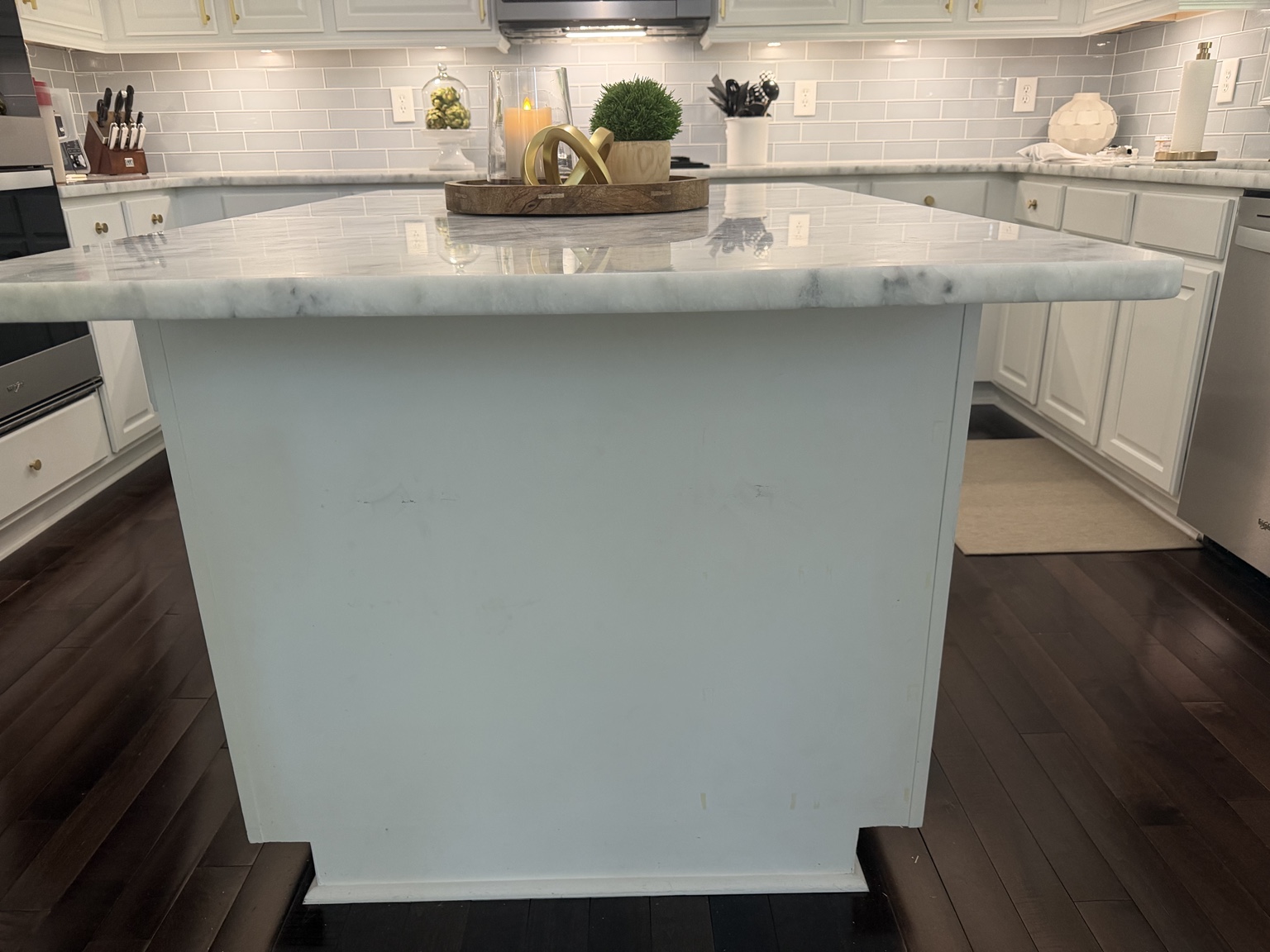 The island after removing the decorative filigree, before adding the new wood.