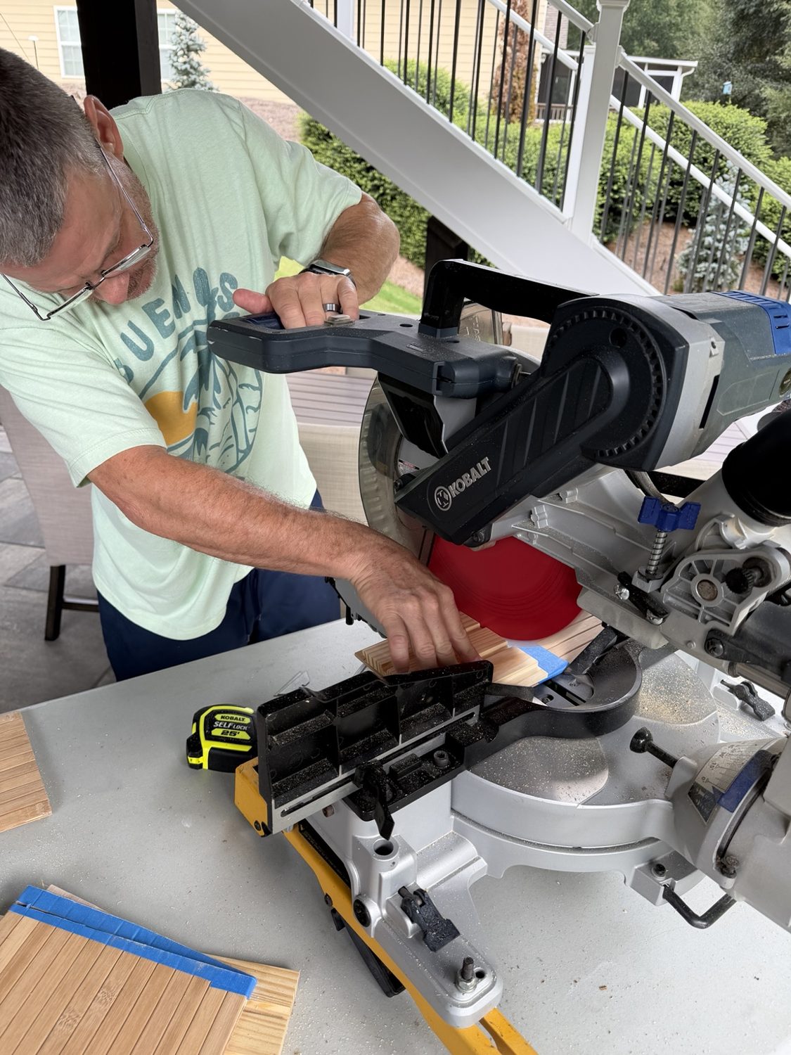 Cutting shiplap to length with the miter saw.